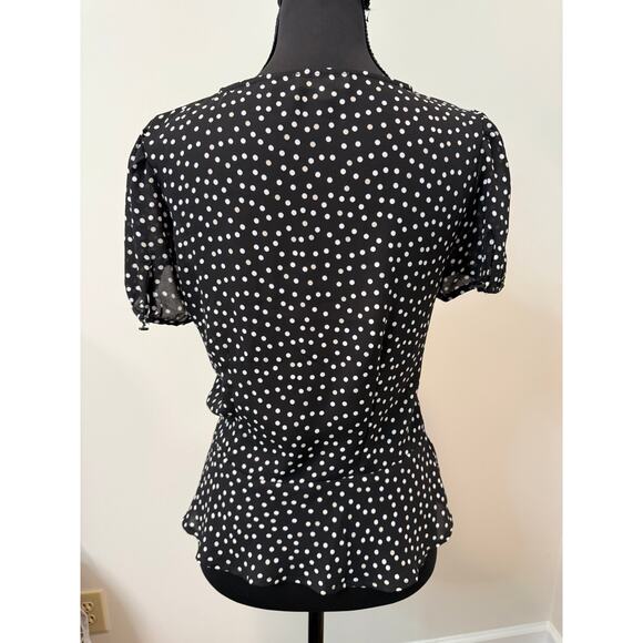 Tamara H. black polka dot wrap top with peplum hem - Picture 2 of 3